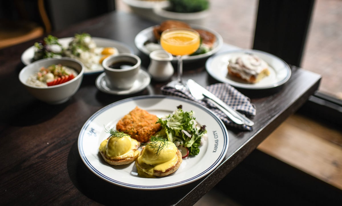 A variety of breakfast items at Rye KC including the popular, eggs benedict.