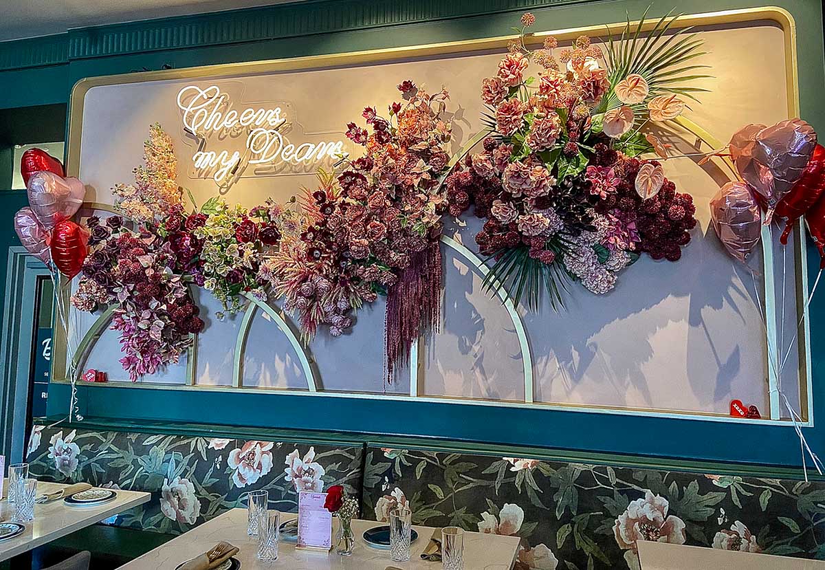 Cute pink and red flower display at Blanc Champagne Bar